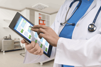 Doctor with tablet device